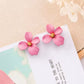 Aretes de florecitas rosa bajito