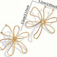 Aretes de flores doradas