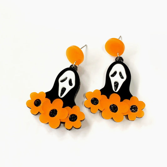 Aretes máscara con flores naranjas