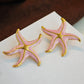 Aretes estrellas rosadas - acero inoxidable