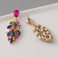 Aretes penacho- rosados