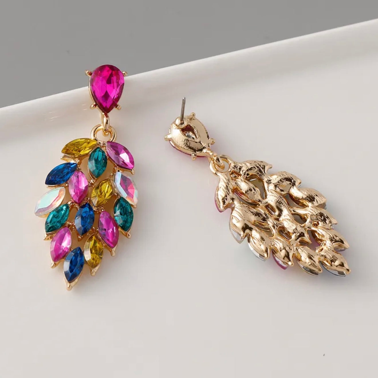 Aretes penacho- rosados