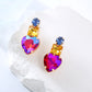 Aretes de corazón rosa y amarillo