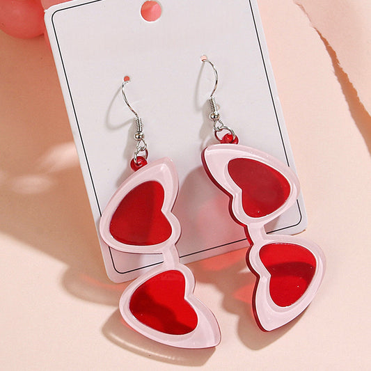 Aretes largos de lentes corazón