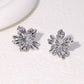 Aretes de flores plateadas- acero inoxidable