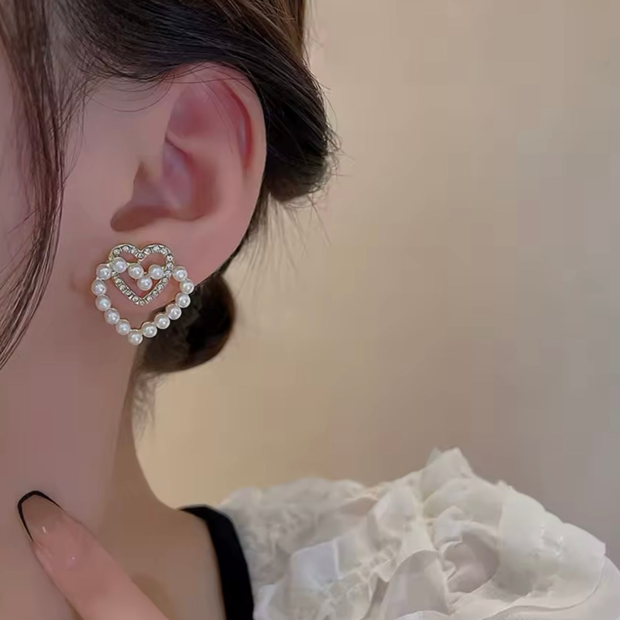 Aretes de doble corazón