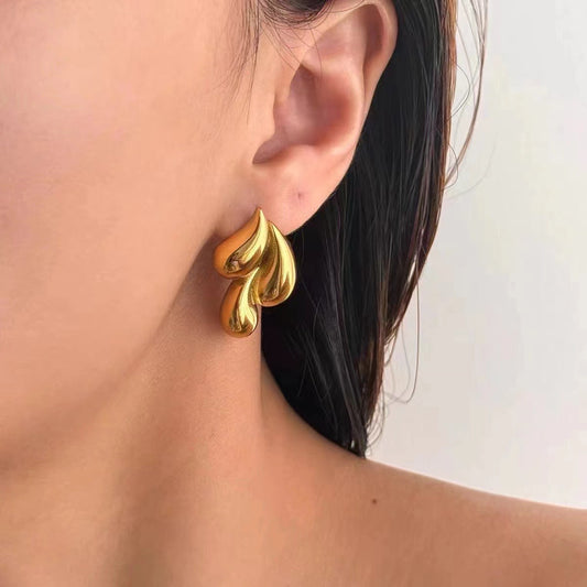 Aretes de gotas doradas