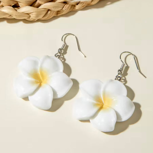 Aretes de florecitas blancas