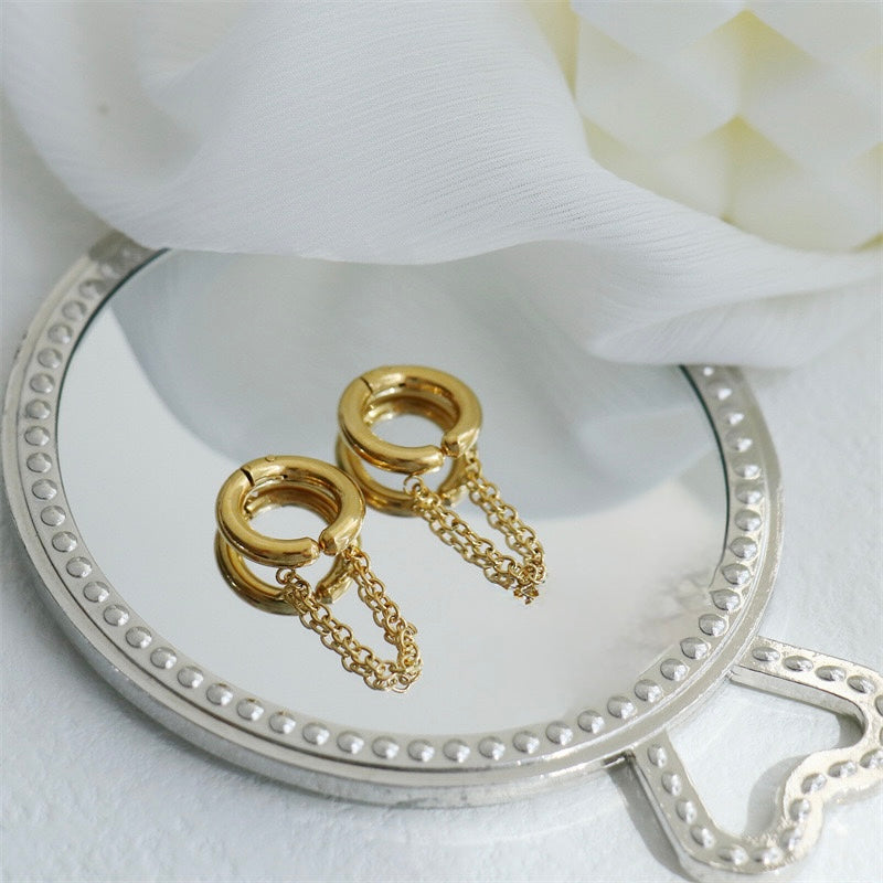Aretes falsos tipo Huggie con cadena - acero inoxidable