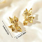 Aretes de flores dorados