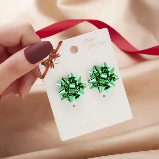 Aretes de moño verde