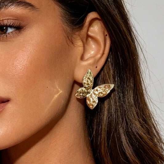 Aretes mariposas doradas