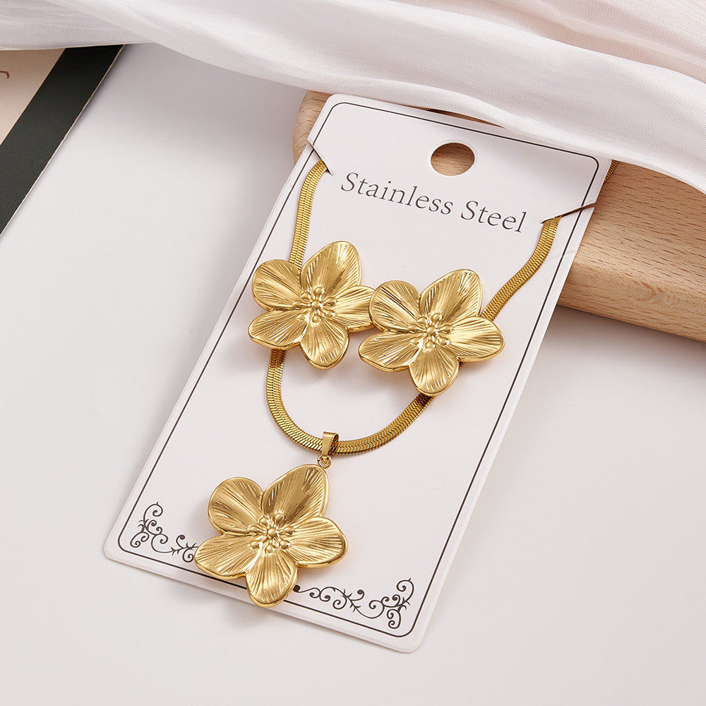 Set de collar + aretes flores doradas- acero inoxidable