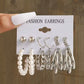 Set de aretes plateados ( 6 pares)