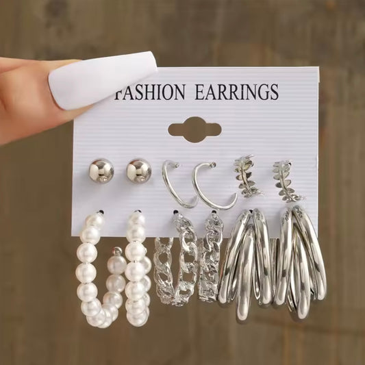 Set de aretes plateados ( 6 pares)