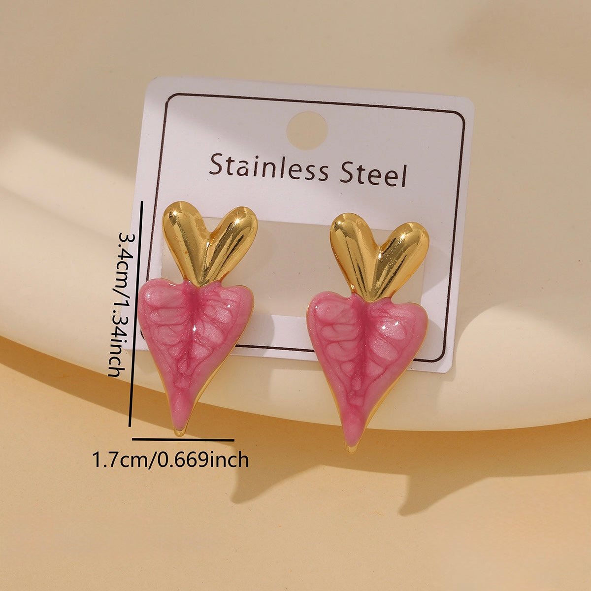 Aretes de corazones rosados - acero inoxidable