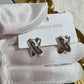 Aretes en cruz plateados- acero inoxidable