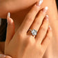 Anillo ajustable de flor plateada- acero inoxidable