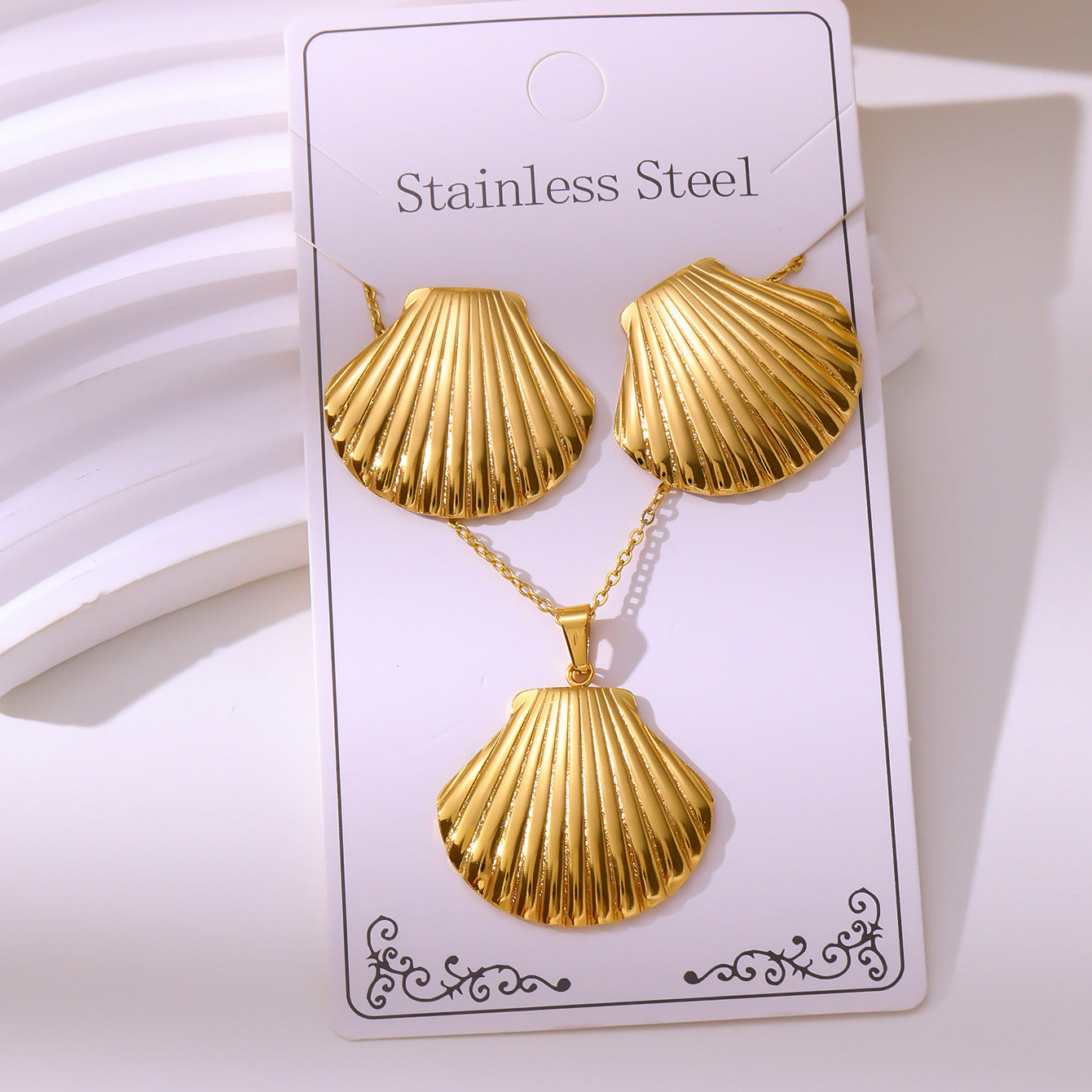 Set de collar + aretes conchas- acero inoxidable
