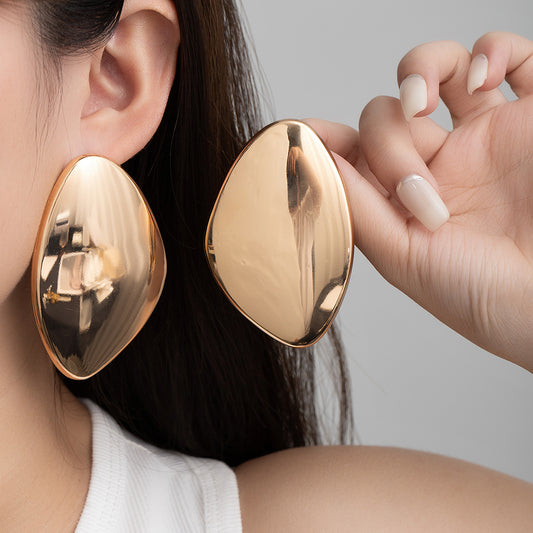 Aretes grandes dorados