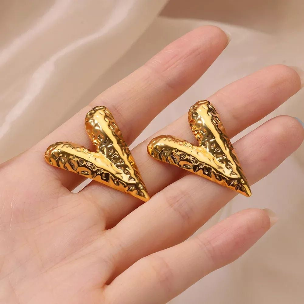 Aretes corazones con textura  - acero inoxidable