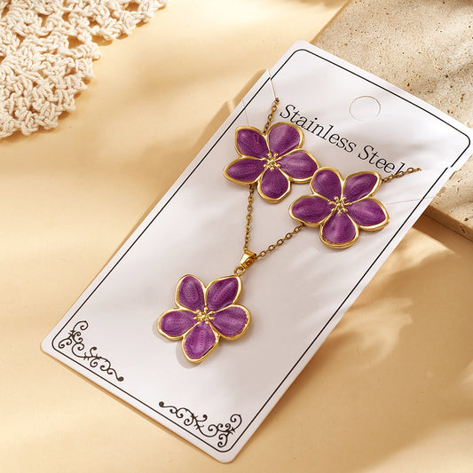 Set de collar + aretes flores moradas - acero inoxidable