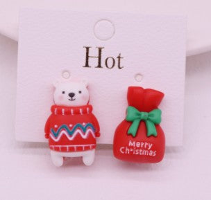 Aretes de clip oso con suéter + bolsa navideña