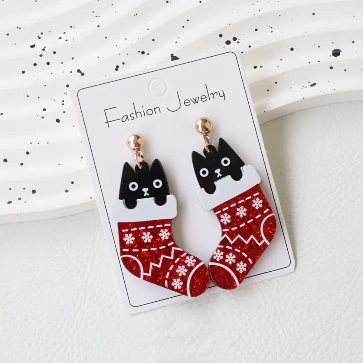Aretes de gatito y bota navideña