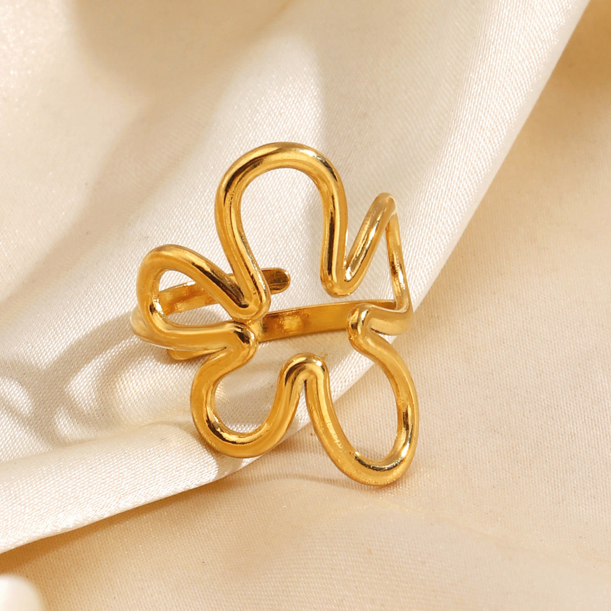 Anillo ajustable flor dorada  - acero inoxidable