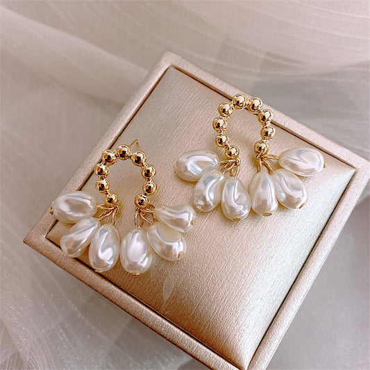 Aretes dorado y blanco