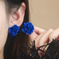 Aretes de flores azules