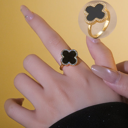 Anillo ajustable de trébol negro- acero inoxidable