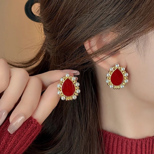 Aretes rojos