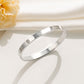 Pulsera plateada con flor - acero inoxidable