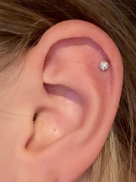 Piercing dorado con pedrería plateada (1 pieza ) - acero inoxidable