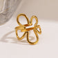 Anillo ajustable flor dorada  - acero inoxidable