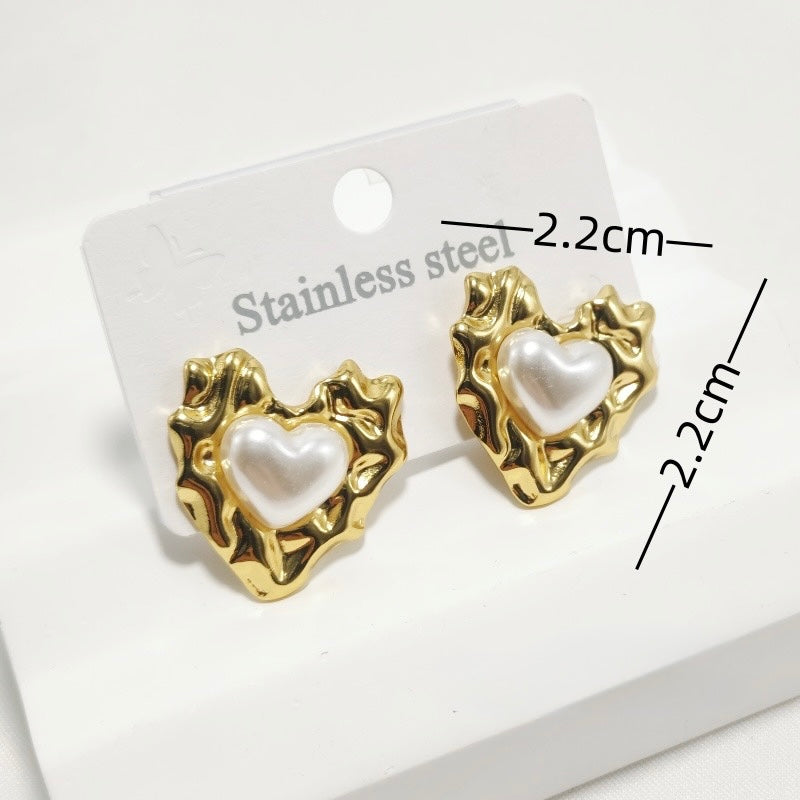 Aretes de corazones dorados con corazón blanco - acero inoxidable