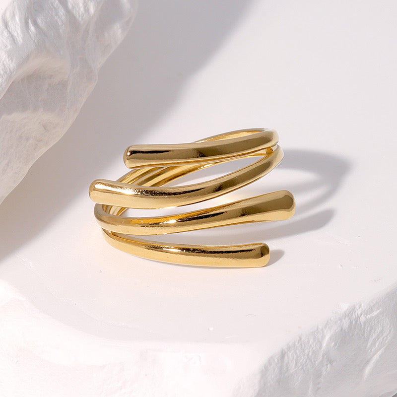 Anillo ajustable Lineas dorado - acero inoxidable
