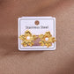 Aretes florecitas doradas con perlita blanca- acero inoxidable