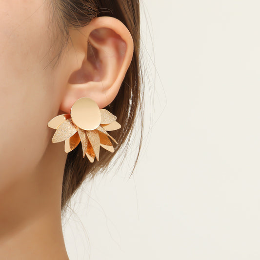 Aretes soles dorados