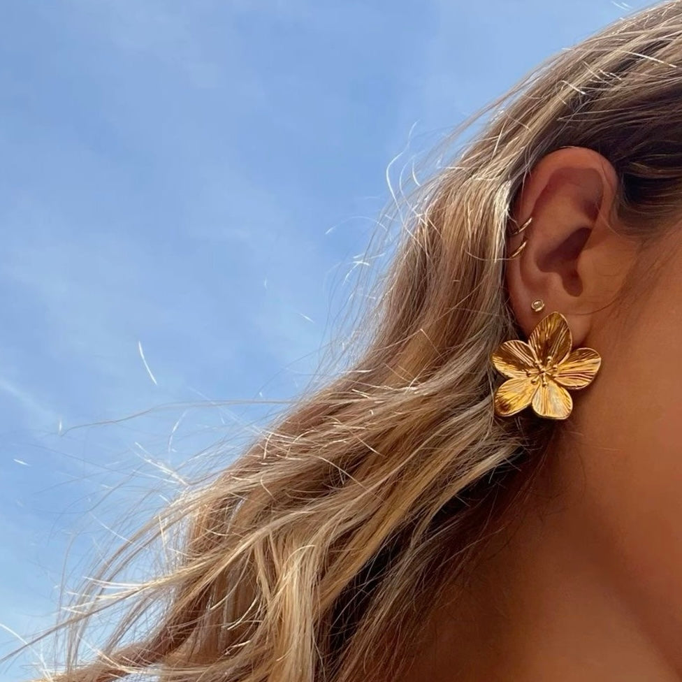 Aretes de flores de acero inoxidable
