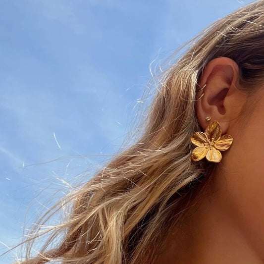Aretes de flores de acero inoxidable
