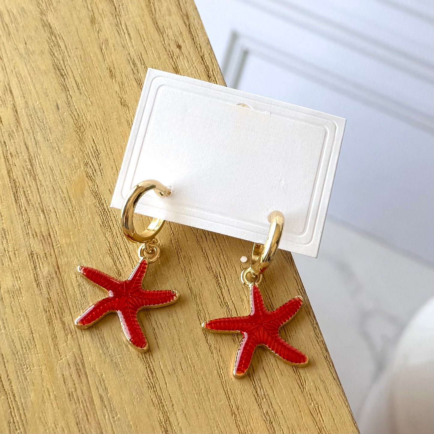 Aretes estrella roja