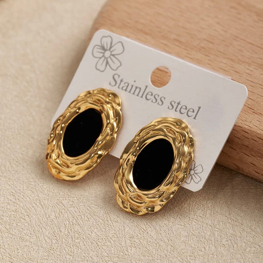 Aretes ovalados dorado y negro- acero inoxidable