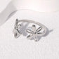 Anillo ajustable de flores plateadas- acero inoxidale
