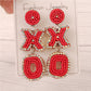 Aretes chaquiras XOXO rojo