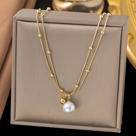 Collar 2 en 1 con perlita blanca - acero inoxidable