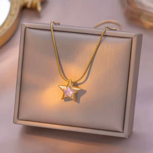 Collar estrella con pedrería rosa - acero inoxidable dorado