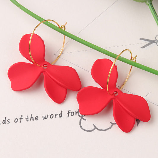 Aretes de flores rojas