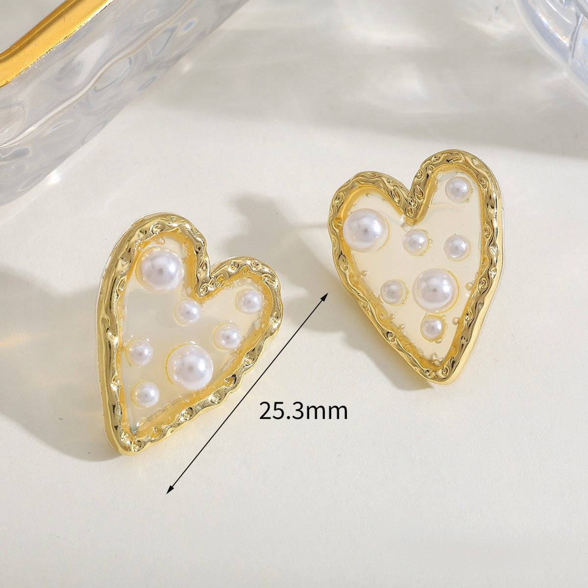 Aretes de corazones transparentes